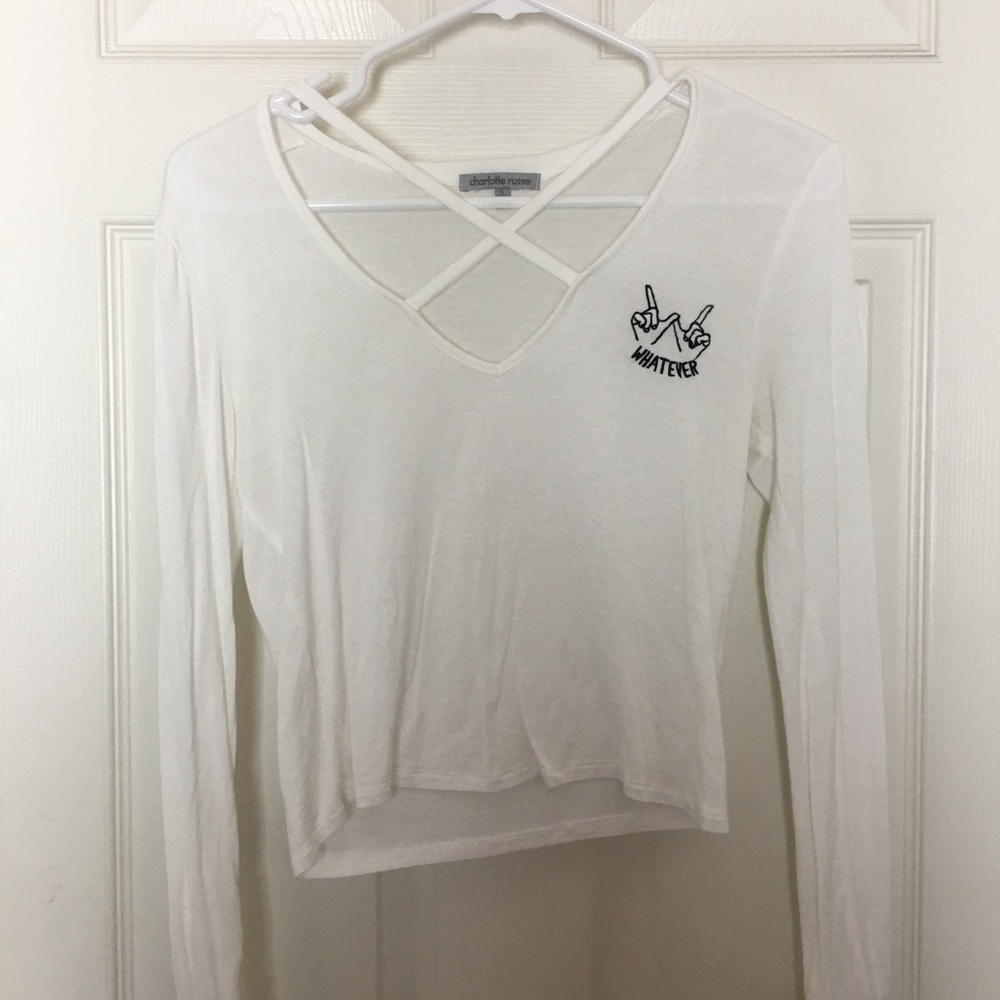 White long sleeve top with criss cross detailing